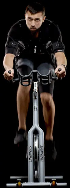 EMS Training, xBody Male riding Bike dressed in EMS Suit